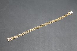 A FACETED THREE BAR LINK BRACELET STAMPED 585, approx weight 16.6g, L 19.5 cm