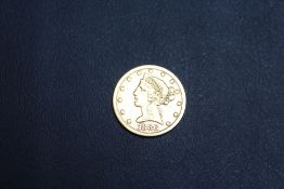 AN AMERICAN GOLD FIVE DOLLAR COIN 1886, approx weight 8.2g