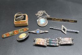 A SMALL COLLECTION OF SILVER AND COSTUME JEWELLERY, to include a Ruskin style brooch
