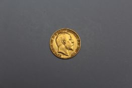 A GEORGE V 1910 HALF SOVEREIGN