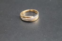 A CHANNEL SET BRILLIANT CUT DIAMOND RING, stamped Cardow 14k585, approx weight 4.6g ring size Q