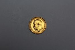 A GEORGE V 1911 HALF SOVEREIGN