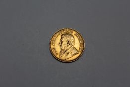 A SOUTH AFRICAN GOLD ONE POND COIN