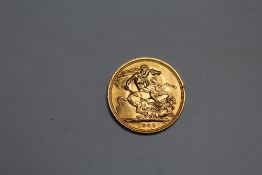 AN ELIZABETH II 1963 GOLD SOVEREIGN