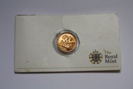 A ROYAL MINT CARDED ELIZABETH II 2010 GOLD HALF SOVEREIGN