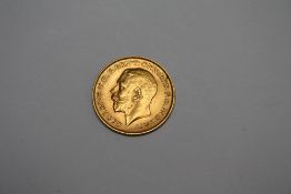 A GEORGE V 1911 GOLD HALF SOVEREIGN