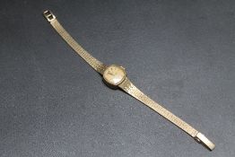 A HALLMARKED 9 CARAT GOLD ROTARY WRIST WATCH, approx weight 19g, W 2 cm