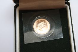 A CASED ELIZABETH II 2000 GOLD HALF SOVEREIGN