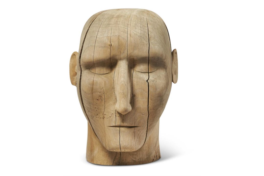 AN OVER LIFE-SIZED CARVED WOODEN HEAD, 20TH CENTURY - Image 1 of 2