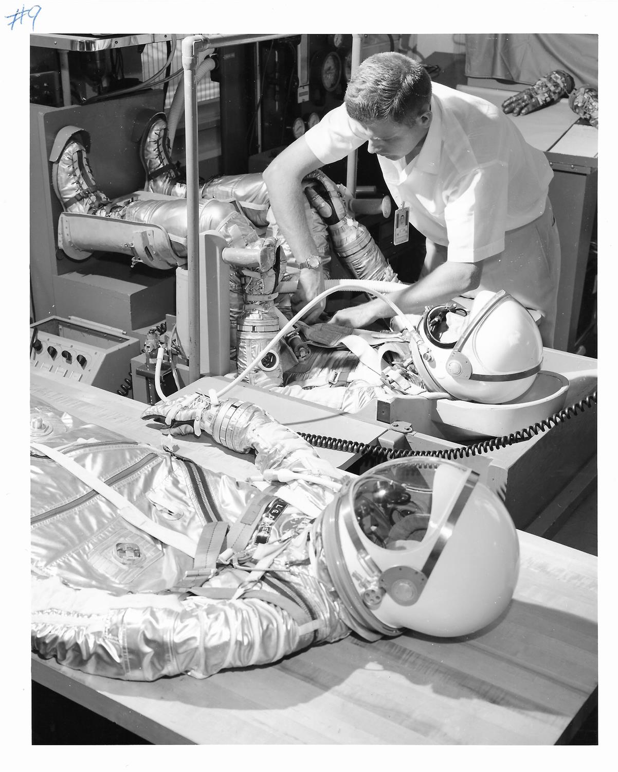 Four views of Walter Schirra preparing for the first six-orbit flight, Mercury Atlas 8, 1962 - Image 4 of 9