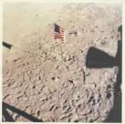 The view of the American flag from the 'Eagle's' window after the moonwalk, Apollo 11, July 1969