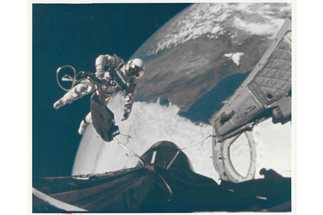 Ed White floats away from the spacecraft during the first American spacewalk, Gemini 4, June 1965 - Image 1 of 2