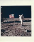 Buzz Aldrin beside the U.S. flag with his face visible inside the visor , Apollo 11, July 1969
