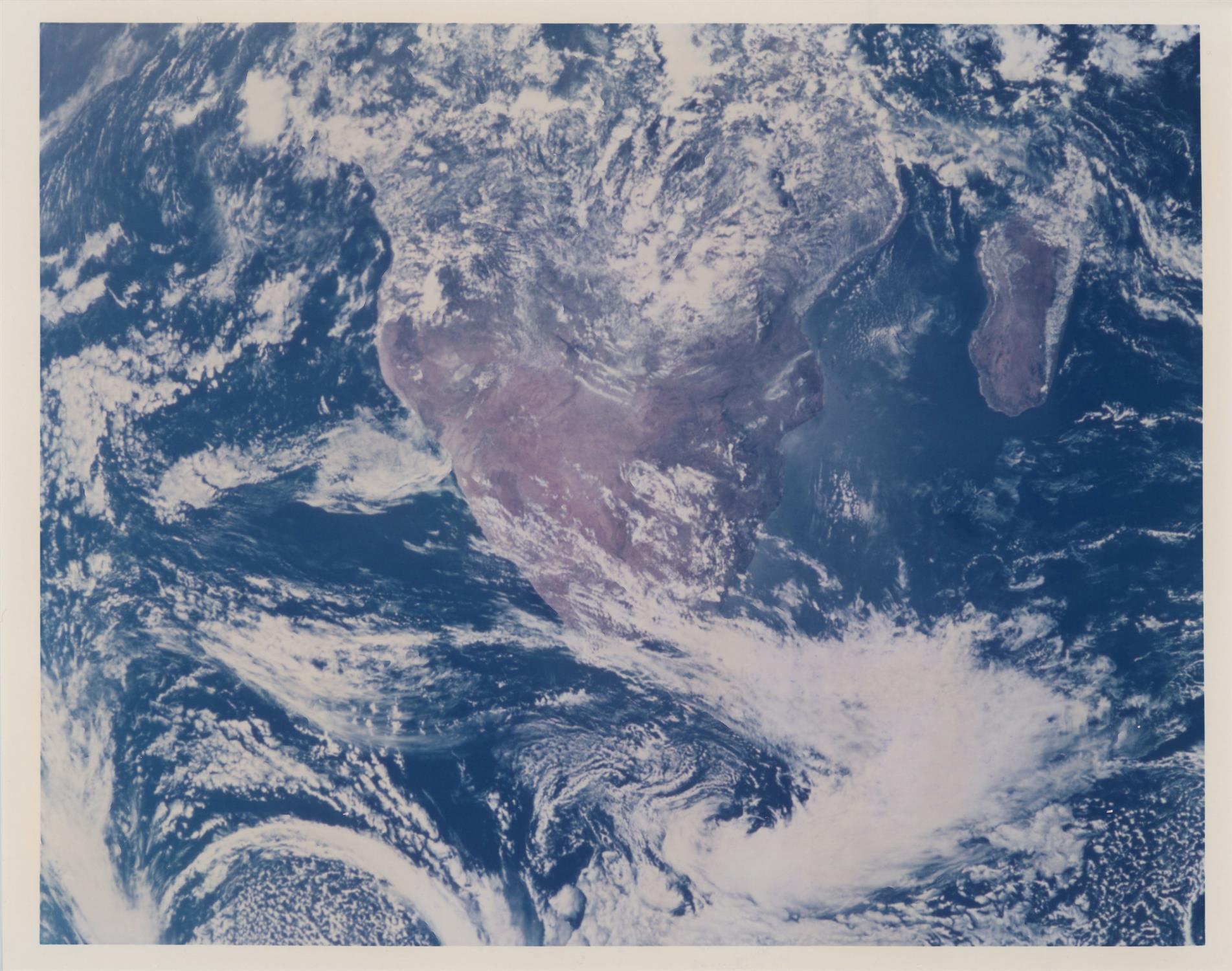 LM during transposition and docking; a view of Earth after jettison, Apollo 17, December 1972 - Image 4 of 5