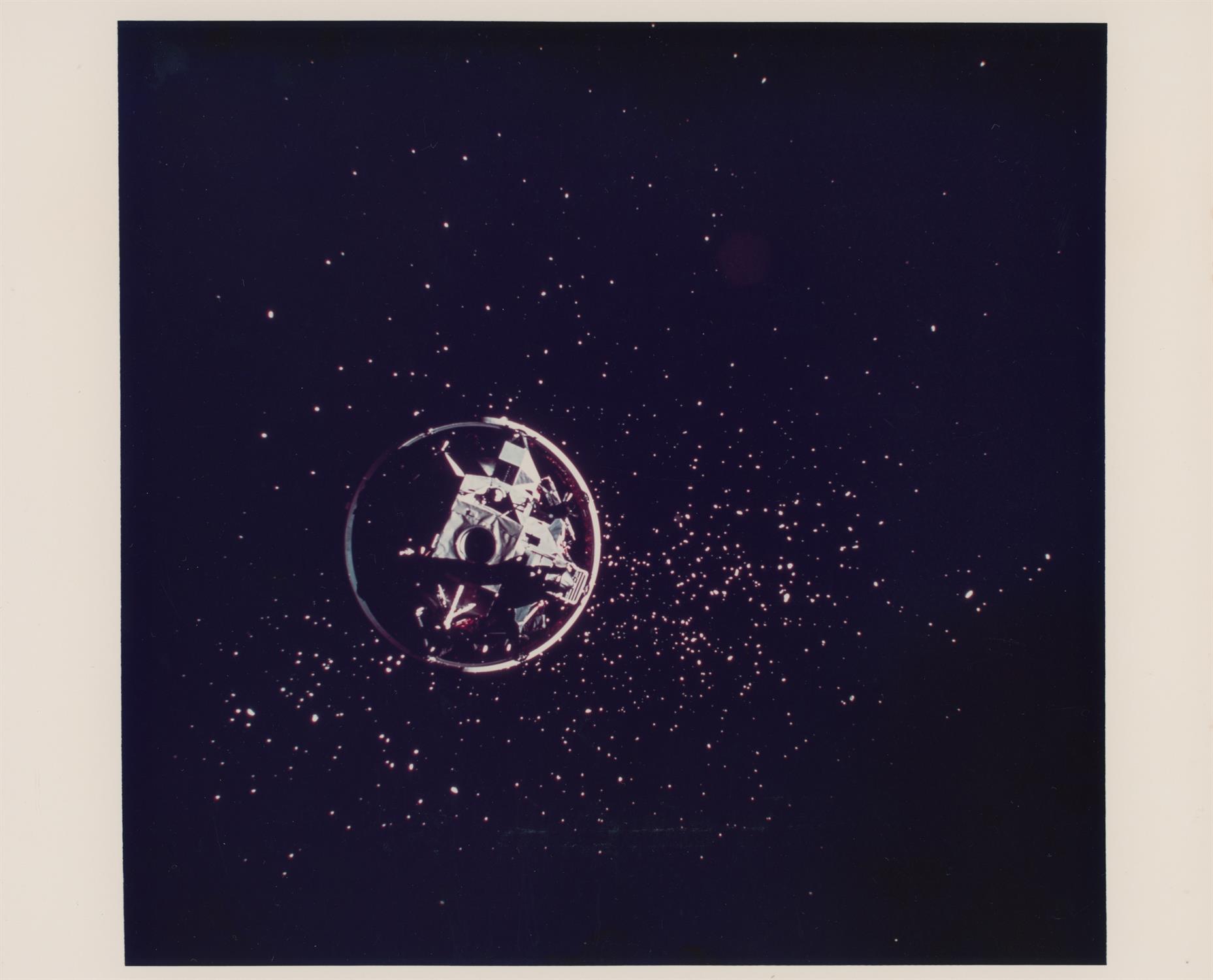 LM during transposition and docking; a view of Earth after jettison, Apollo 17, December 1972 - Image 2 of 5