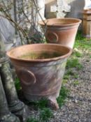 A pair of French oversized terracotta jardinieres