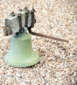 A Victorian bronze and iron mounted bell, J. Warner & Sons, London