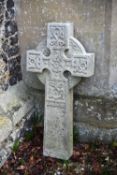 A sculpted white marble cross