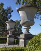 A pair of carved limestone urns, after Andrea Palladio (1508-80)