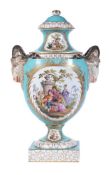 A Dresden pale-blue ground and gilt two-handled porcelain vase and cover