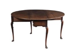 A George II walnut drop leaf dining table