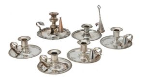 A set of four electro-plated circular chambersticks by Elkington & Co.