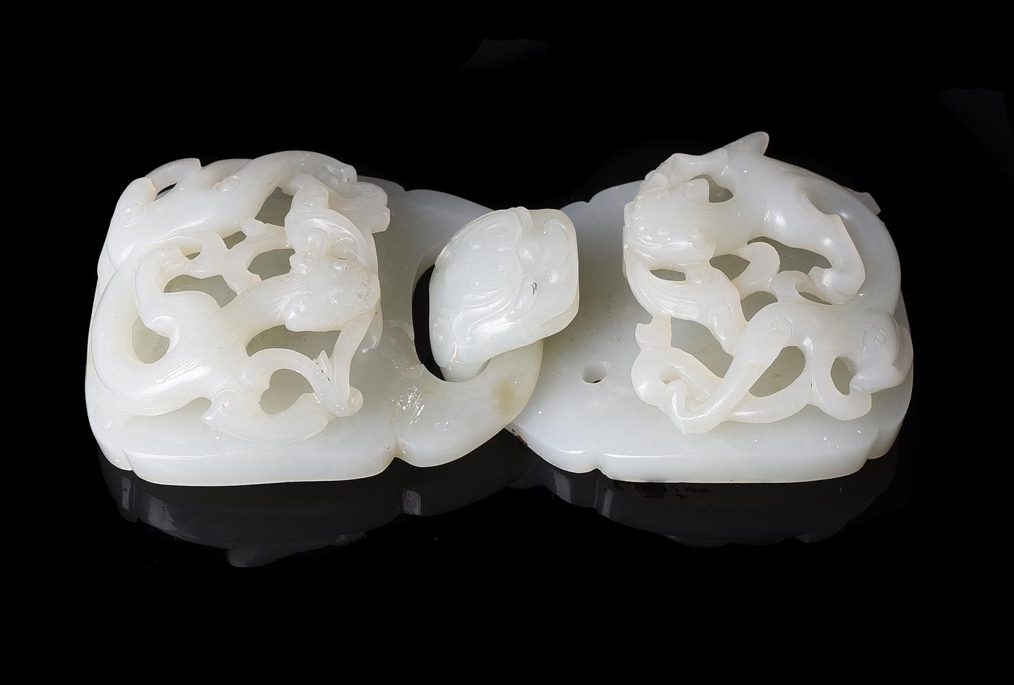 A Chinese pale celadon jade buckle