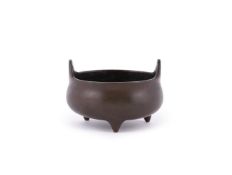 A Chinese bronze small tripod censer