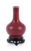 A small Chinese sang-de-boeuf vase