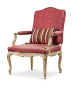 A REGENCE STYLE CARVED AND PAINTED FAUTEUIL, EARLY 20TH CENTURY