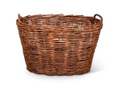 A LARGE WICKER LOG BASKET
