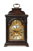 A GEORGE III EBONISED PEARWOOD TABLE CLOCK
