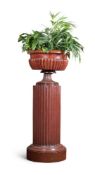 A GEORGE IV MAHOGANY WINE CISTERN, CIRCA 1830