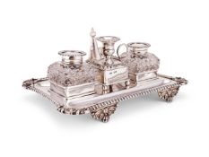 A late Victorian silver shaped Victorian two bottle inkstand by D. & J. Wellby