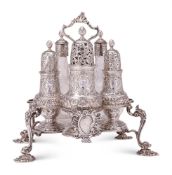 An early George III silver Warwick cruet stand by Alexander Johnston
