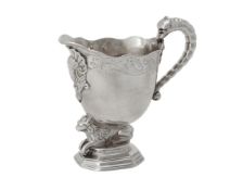 A George II unmarked silver cream jug attributed to David Willaume