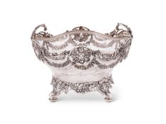 An Edwardian silver mounted cut glass quatrelobed bowl by William Comyns & Sons