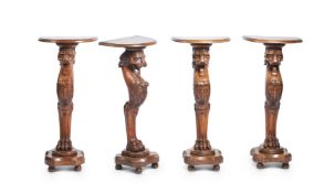 A SET OF FOUR ITALIAN CARVED WALNUT PEDESTALS, 20TH CENTURY