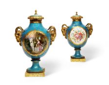 A PAIR OF FRENCH SÈVRES STYLE ORMOLU MOUNTED VASES AND COVERS