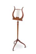 A GEORGE III STYLE SATINWOOD AND PAINTED MUSIC STAND, LATE 19TH CENTURY