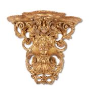 A RÉGENCE CARVED GILTWOOD WALL BRACKET, CIRCA 1720