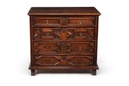 A Charles II oak chest of drawers