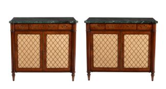 A graduated pair of side cabinets, in Regency style