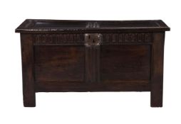 A Charles II panelled oak coffer