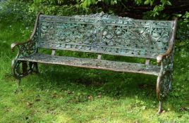 A cast iron garden bench