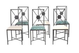 A metal suite of dining furniture