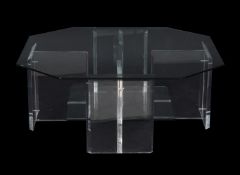 A Perspex and glass low centre table