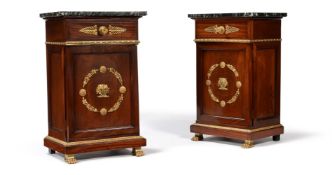 A pair of French mahogany and giltmetal mounted bedside cabinets