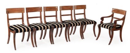 A SET OF FOURTEEN REGENCY MAHOGANY AND BRASS STRUNG DINING CHAIRS, CIRCA 1815
