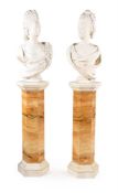 A PAIR OF WHITE MARBLE BUSTS OF LADIES OF HIGH FASHION, WITH SIENA MARBLE PEDESTALS